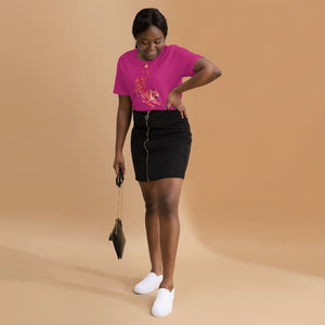 AG - Woman wearing a berry t-shirt, with a tiger graphic design, on a beige background
