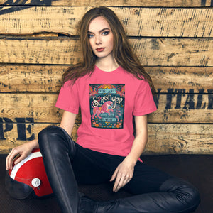 AG - Woman wearing a charity pink t-shirt with, stronger than you realize, graphic design sitting against a wooden wall.