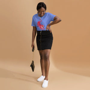 AG - Woman wearing a heather columbia t-shirt, with a tiger graphic design, on a beige background
