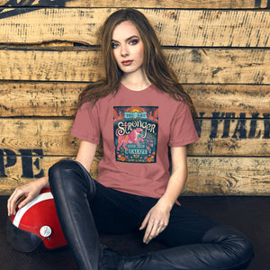 AG - Woman wearing a mauve t-shirt with, stronger than you realize, graphic design sitting against a wooden wall.
