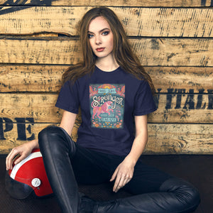 AG - Woman wearing a navy t-shirt with, stronger than you realize, graphic design sitting against a wooden wall.