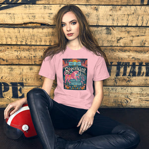 AG - Woman wearing a pink t-shirt with, stronger than you realize, graphic design sitting against a wooden wall.