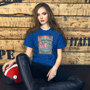AG - Woman wearing a royal blue t-shirt with, stronger than you realize, graphic design sitting against a wooden wall.